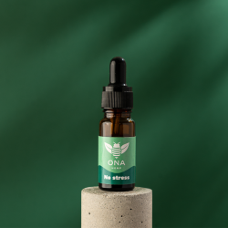 Flacon d'huile de CBD sur fond vert